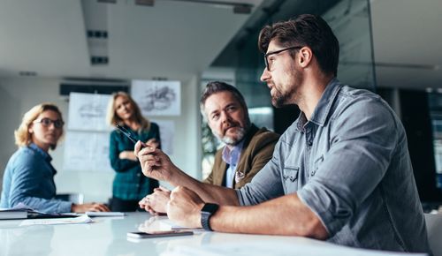 Professionals discussing over new business project